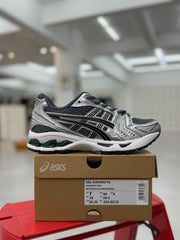 ASICS Gel Kayano 14 gray sneakers