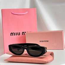 Sunglasses Miu Miu
