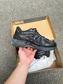 1906A New Balance Black 2025 (lacets offet)