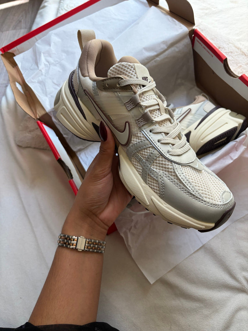 Nike V2K Run cream and plum, three-quarter view